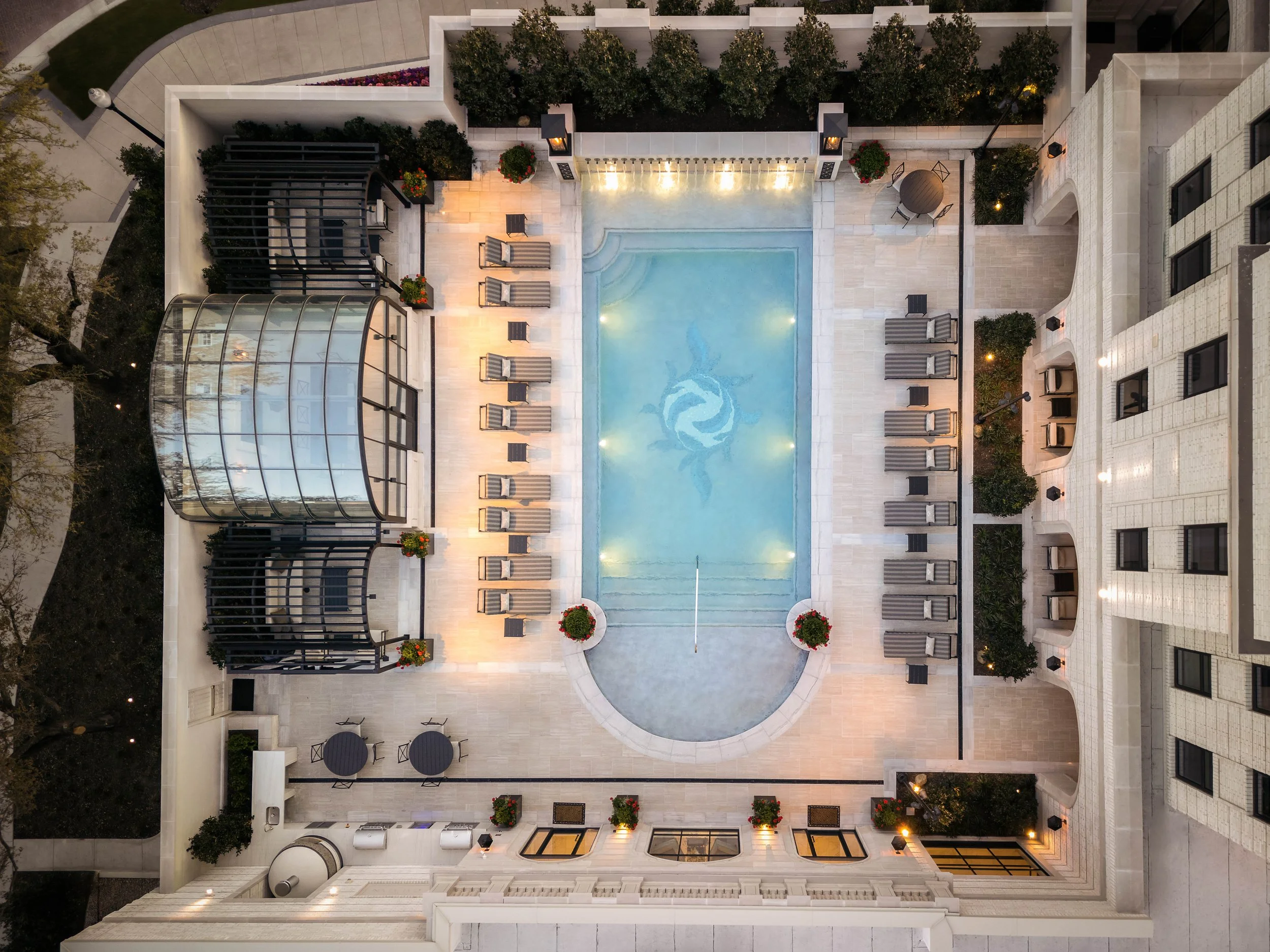 Aerial overhead view of outdoor pool courtyard and rooftop terrace — drone architecture photography, The Galatyn Dallas TX