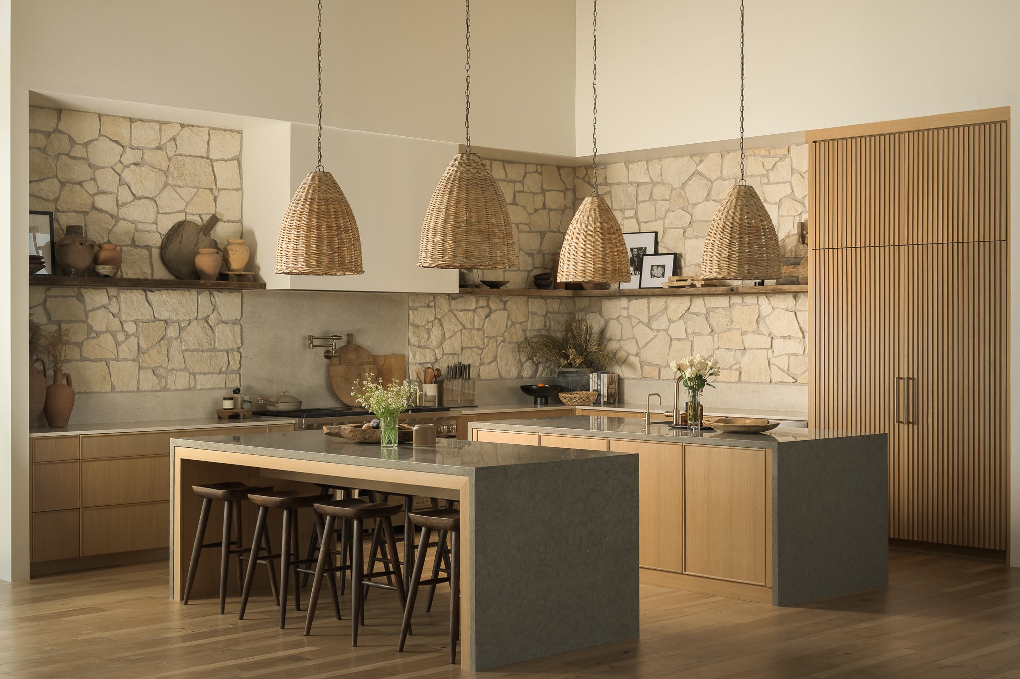 Modern kitchen with open shelving, natural materials, and pendant lighting — residential interior photography