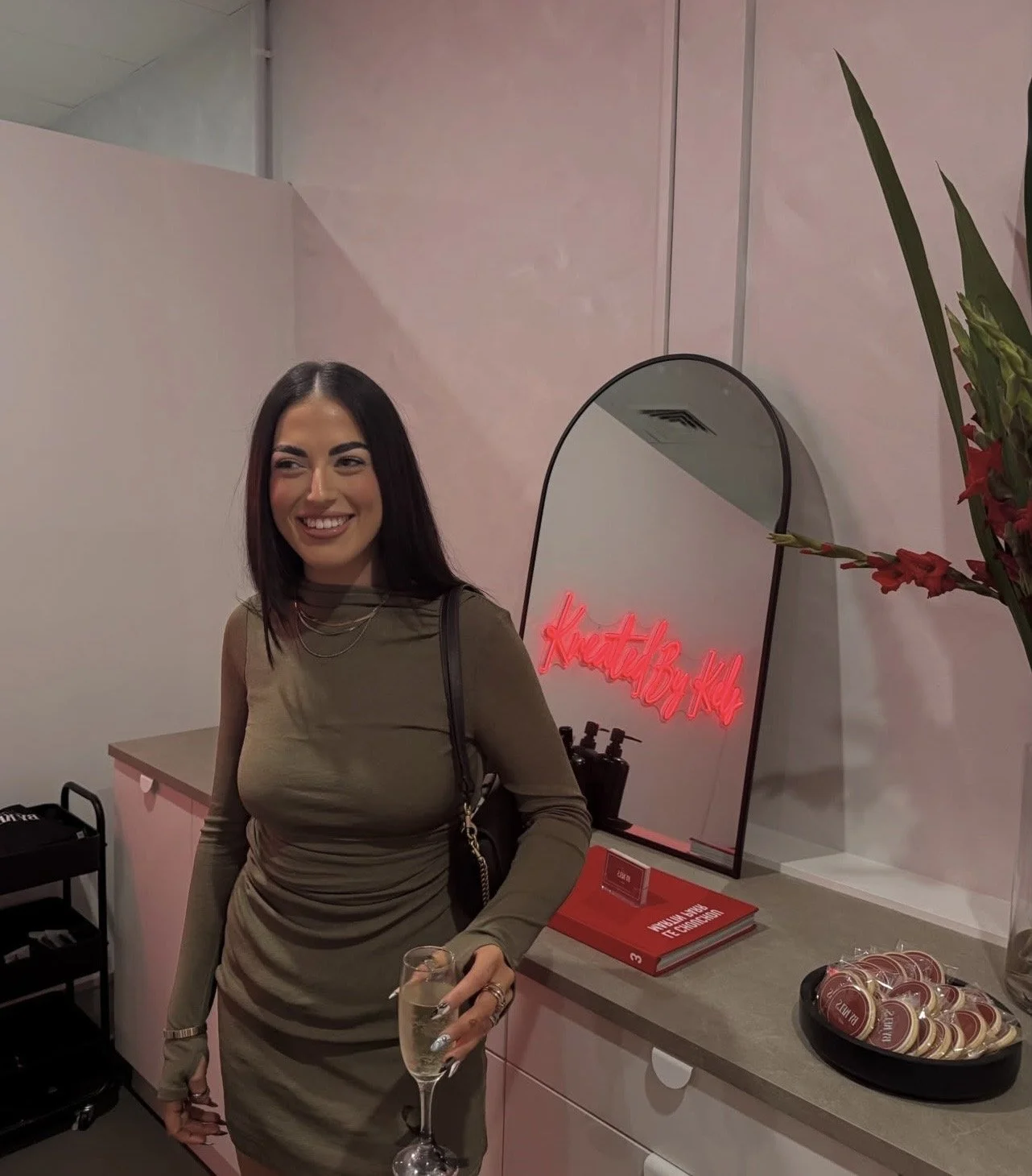 Image of woman posing in front of mirror
