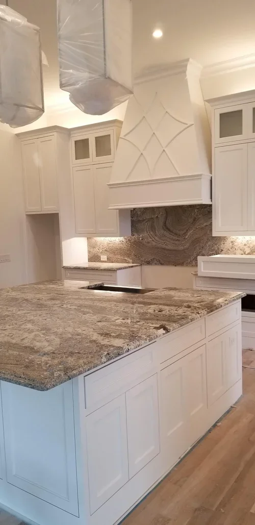 Las Colinas

-

From intricately detailed custom range hoods to hand-selected stone surfaces that define a room, we masterfully build the unique features that generic builders avoid.