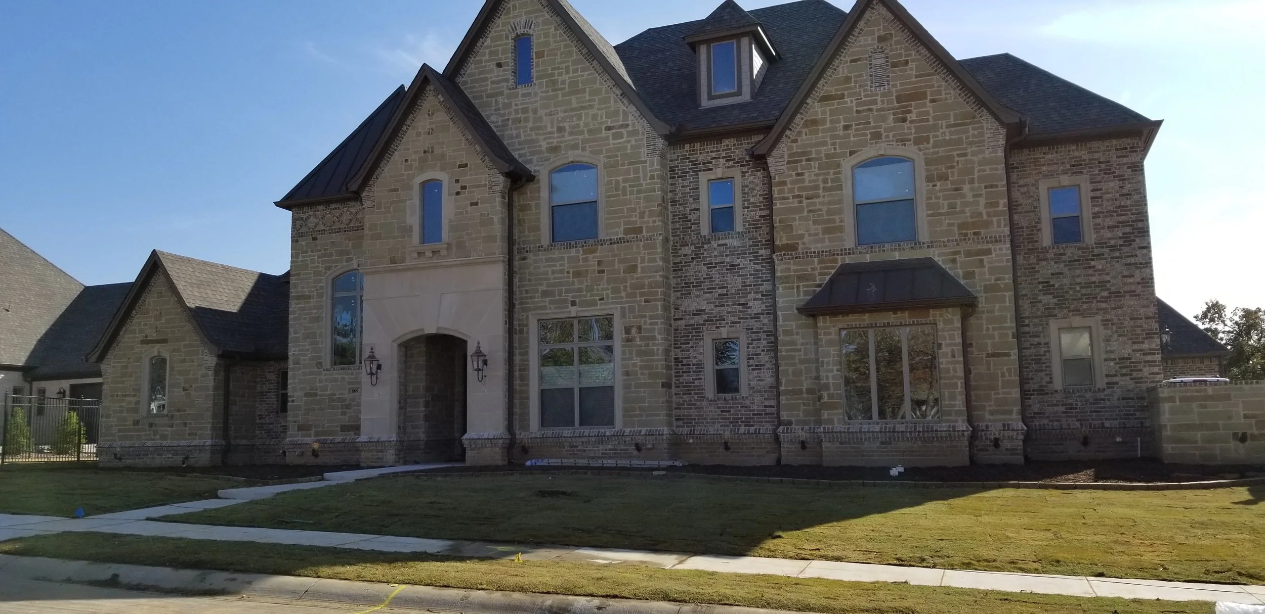 
Outside shot of a custom luxury home in Colleyville. Complete with premium stone local to Texas, precise elevations and manicured landscaping.