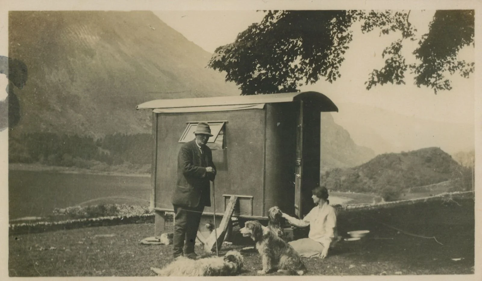 Griffith Owen who farmed Hafod Lwyfog in the 1920's and his housekeeper Maggie Jones with a Shepherds hut at Llyn Gwynant. Griffith and his brother John Owen bought the farm of 546 acres for £1525. John Owen farmed Bwlch (at the far end of the lake, 
