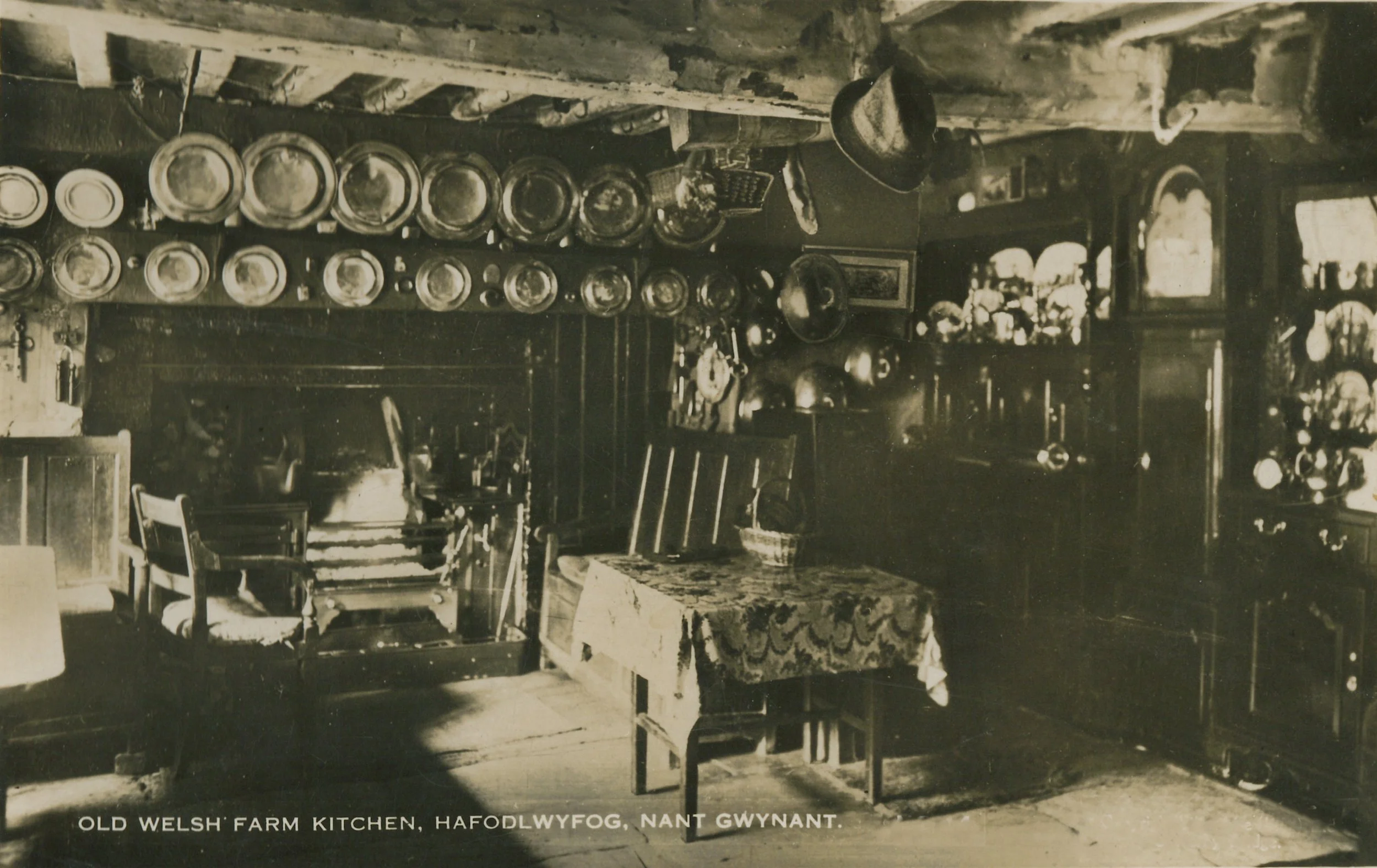 Postcard showing Hafod Lywfog farmhouse interior, 1932.