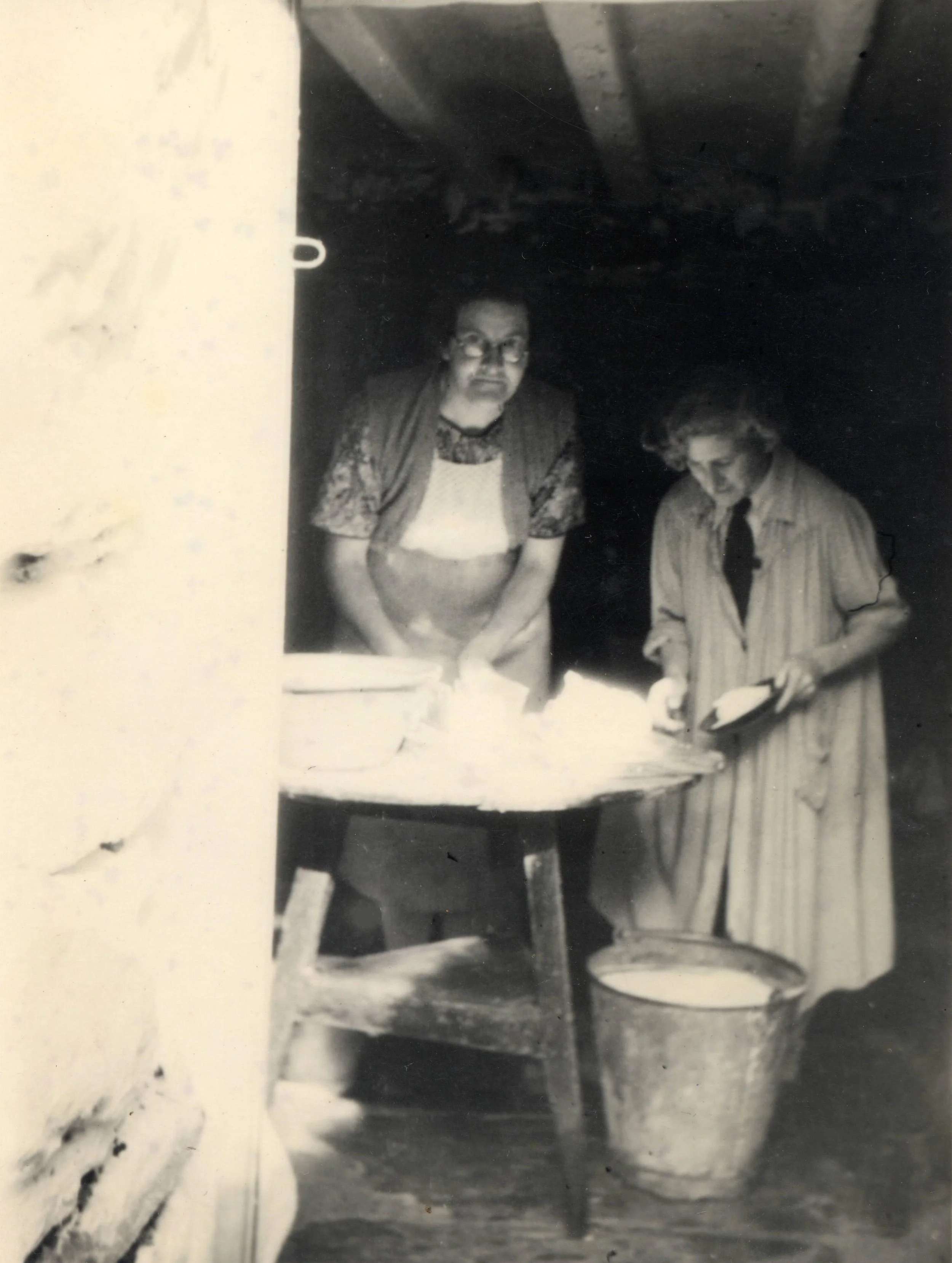 Making butter in the cellar/dairy of Hafod Lwyfog farmhouse in the 1930s or 1940s.