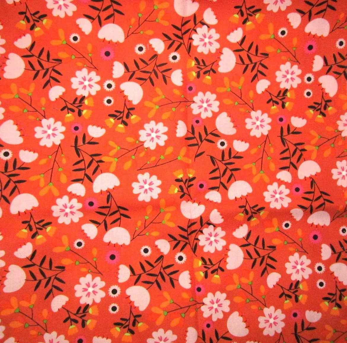 Poppie Cotton Not Scary Orange with Floral Motif