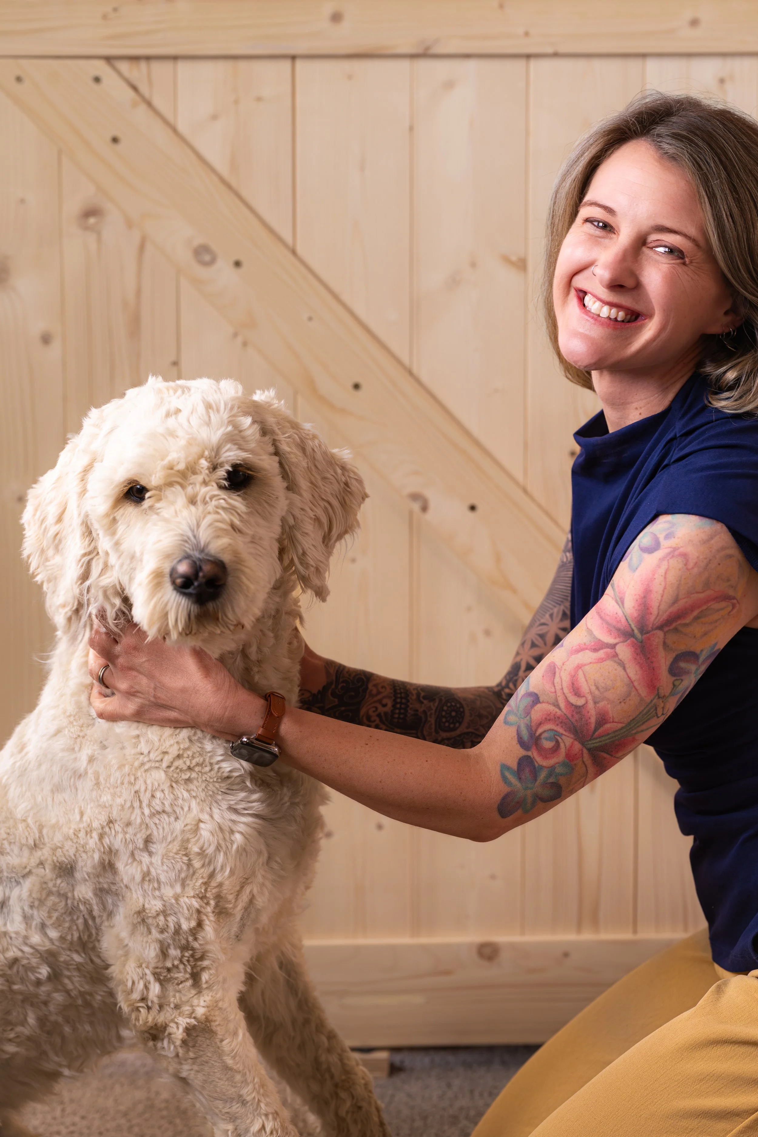 PA Jenn & her dog looking at the camera offering holistic mental health care