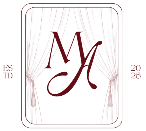 A red letter 'M' in the center with white curtains on the sides and a red background.