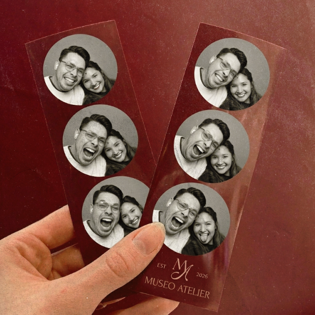 Two transparent photo strip cards, each with three black-and-white photos of a man and woman laughing and smiling, held by a person's hand against a red background.