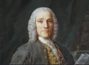 Portrait of an older man with long white hair, wearing ornate clothing with gold embroidery and a high-collared shirt.