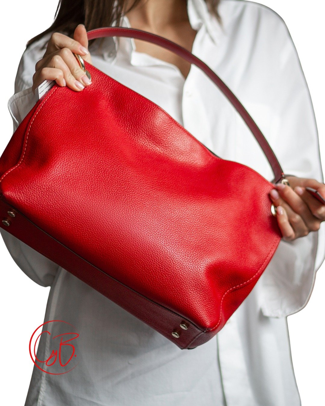 If bold colour feels like a big leap, start small &mdash; one statement piece against a wardrobe you already trust. A red bag. A white shirt. That's it. That's the whole outfit, and it's enough to change how you feel walking into a room.

This is the
