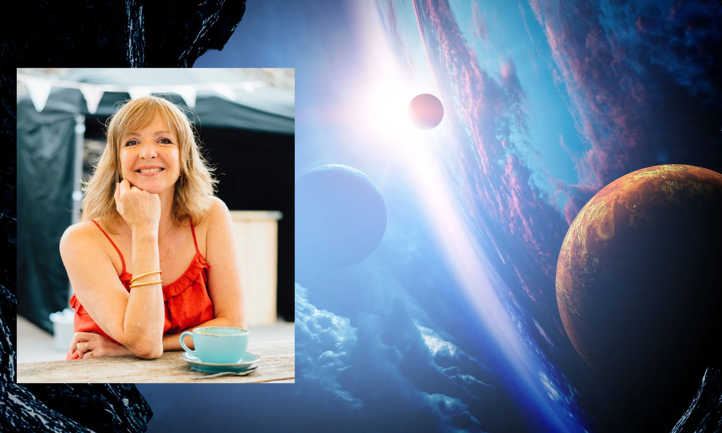 A smiling woman with blonde hair wearing a sleeveless orange top sitting at a table with a mug in front of her. She has her chin resting on her hand and is looking at the camera. In the background is a cosmic scene of planets and clouds in space.