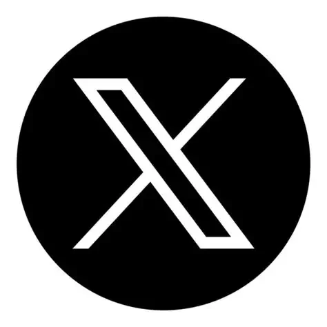 Black circle with a white stylized 'X' logo in the center.