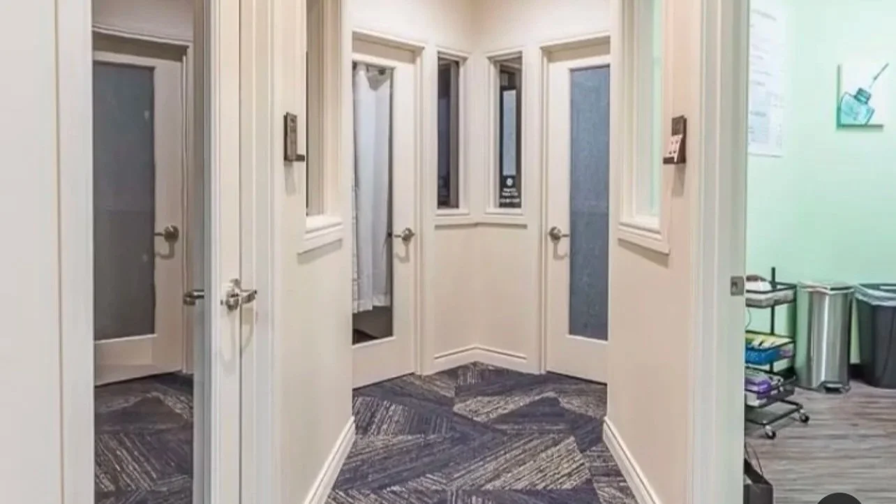 hallway with multiple salon offices at Phenix Salons Raleigh NC