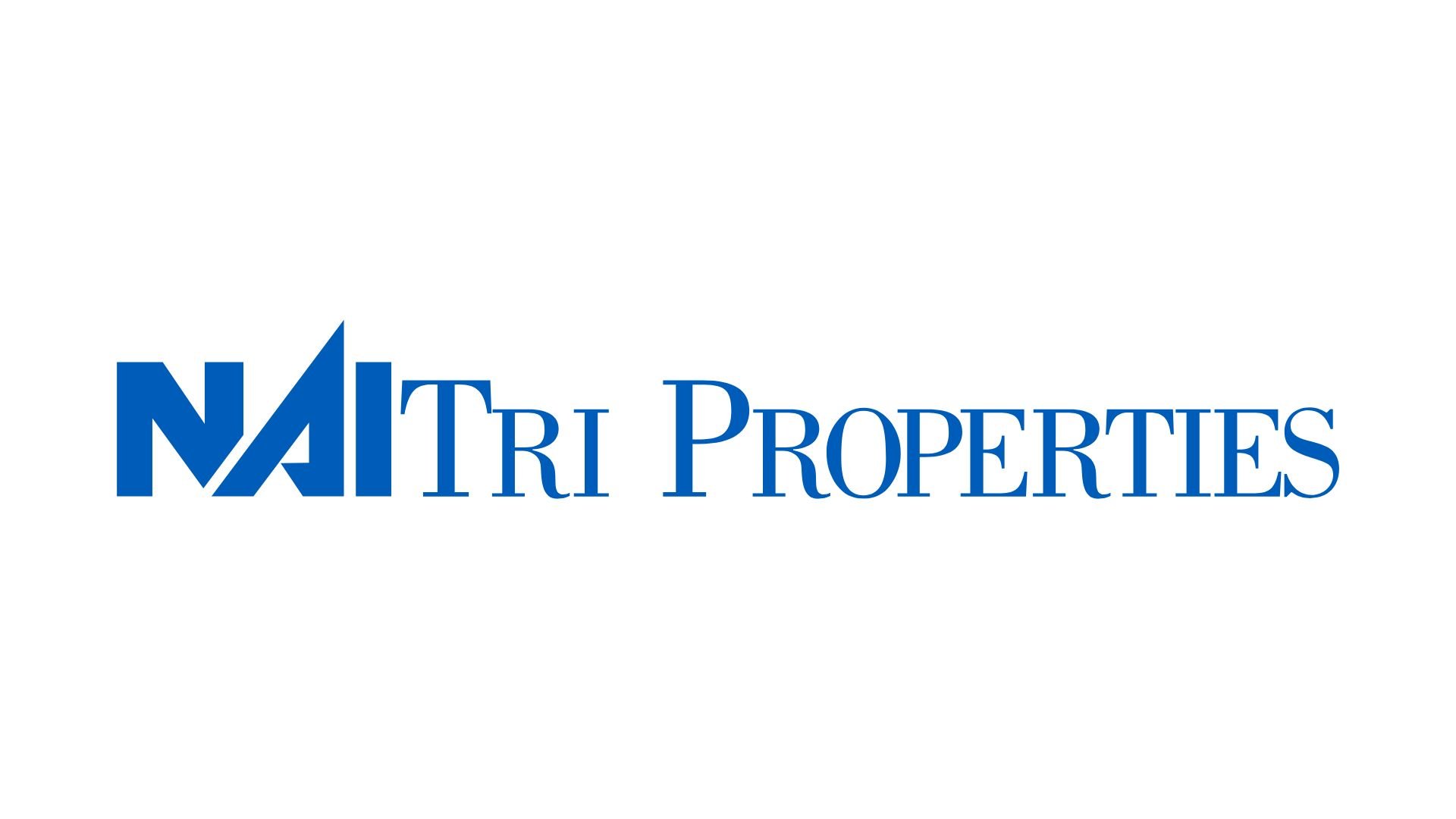 Logo for NAI Tri Properties featuring a stylized N, A, and I, with the company name written in blue text.