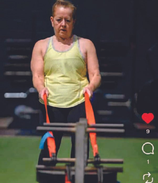 Woman over 40 strength training at the gym representing the fitness and health outcomes of the Metabolic Balance program