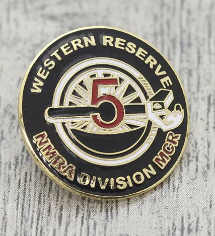 A pin featuring the Western Reserve Naval Division Yard with the number 5 and an anchor symbol.
