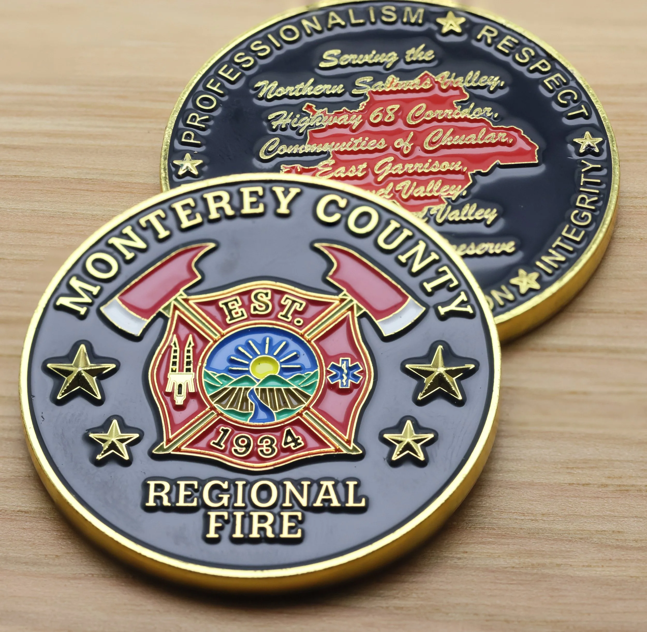 Colorful challenge coin for Northern Saluda Valley, Highway 68 Corridor, Communities of Chualar, East Garrison, and Valley, part of the Monterey County Regional Fire District, established in 1934.