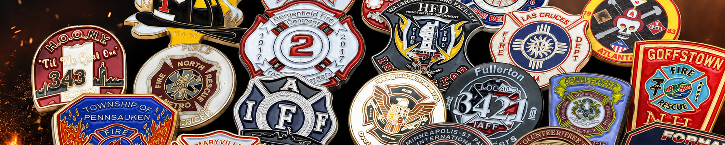 A collection of fire department badges and patches from various fire departments, featuring different colors, symbols, and text.