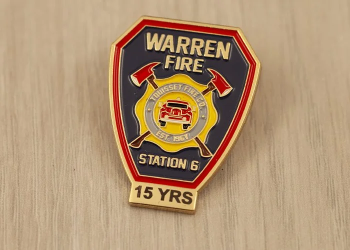 A Fire Department years of service pin for Warren Fire, Station 6, celebrating 15 years of service.