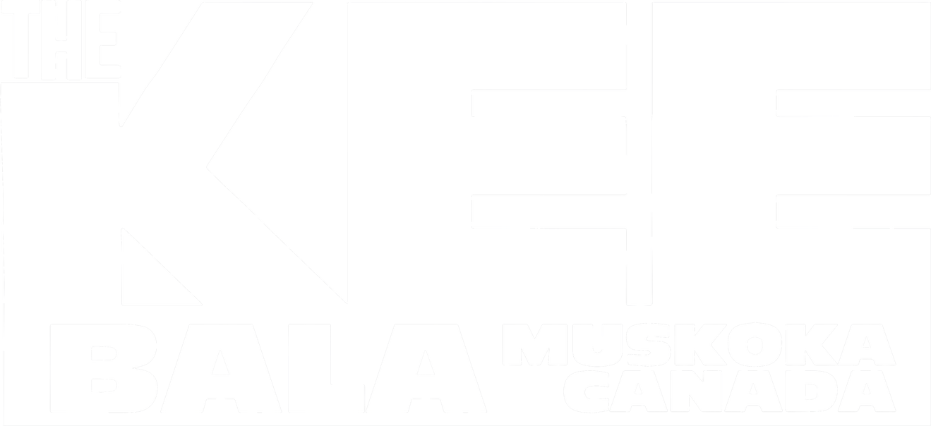 A black and white logo with large bold letters spelling 'THE KEE BAL A MUSKOKA CANADA'