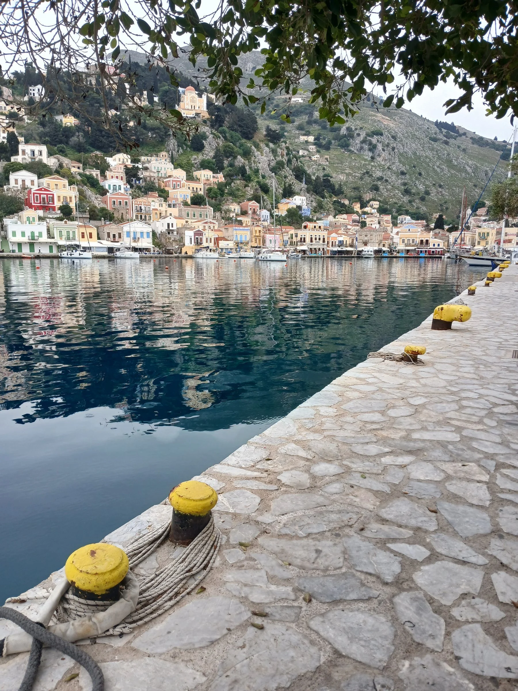 Still waters mirroring the timeless rhythm of the harbor.