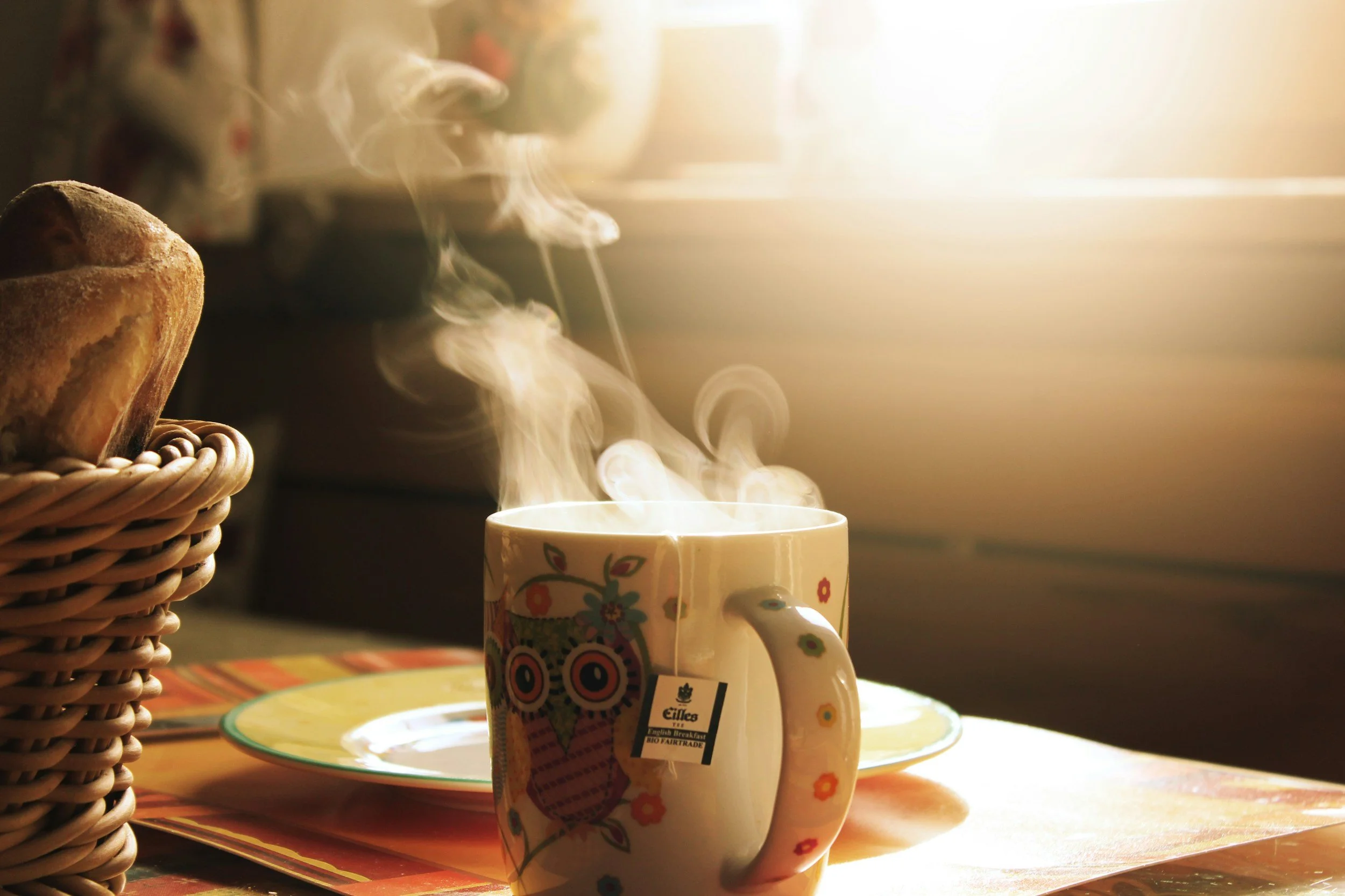 A warm cup of tea on a bright table