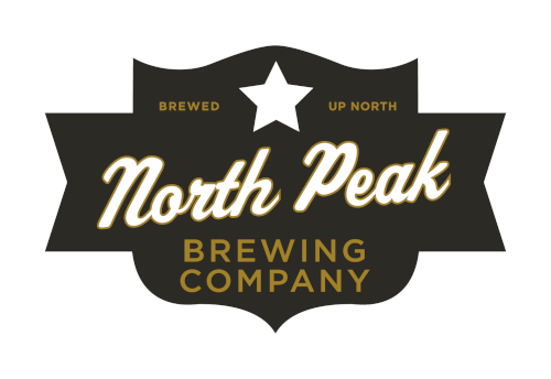 The North Peak Logo with their name and the text Brewed Up North and Brewing Company in white and gold font on their black badge