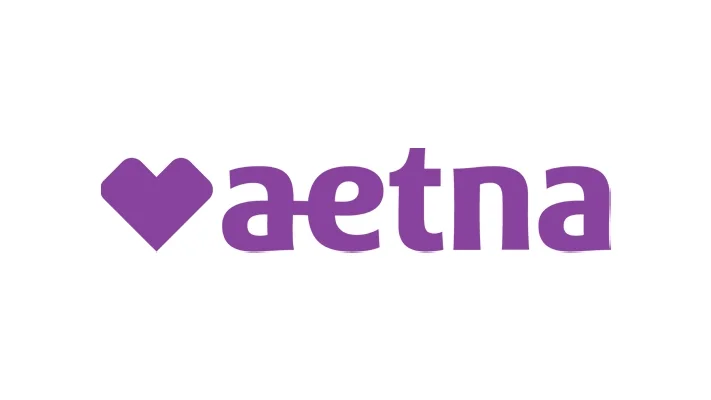 A purple heart icon next to the word "aetna" in purple lowercase letters on a white background.