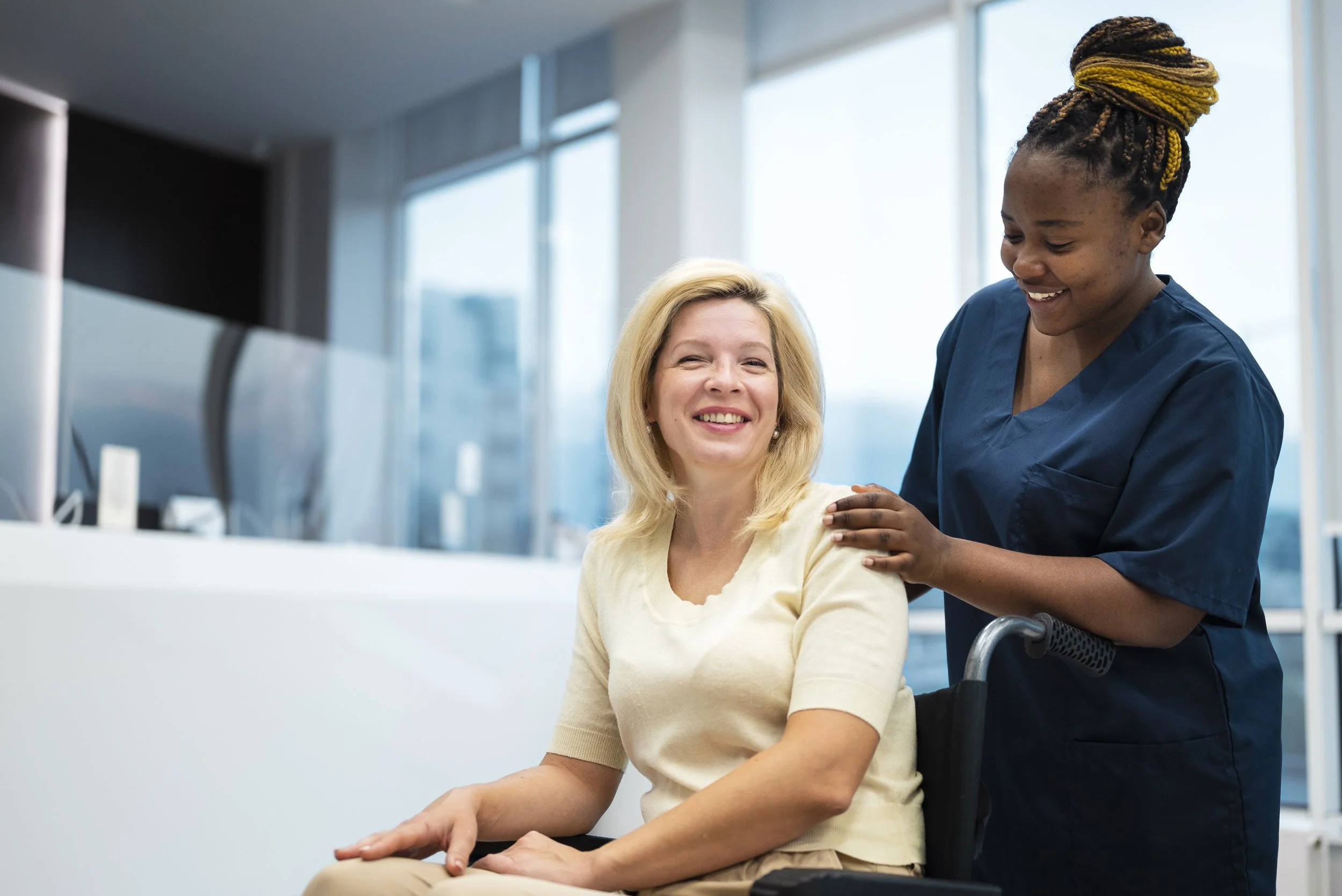 Home care aide assisting senior patient with daily activities