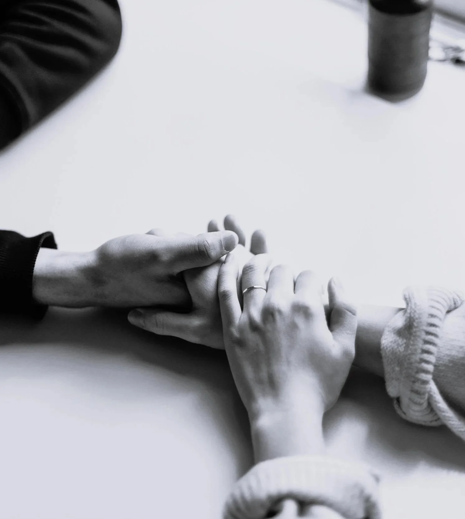 Compassionate hands offering comfort and support during pregnancy and infant loss