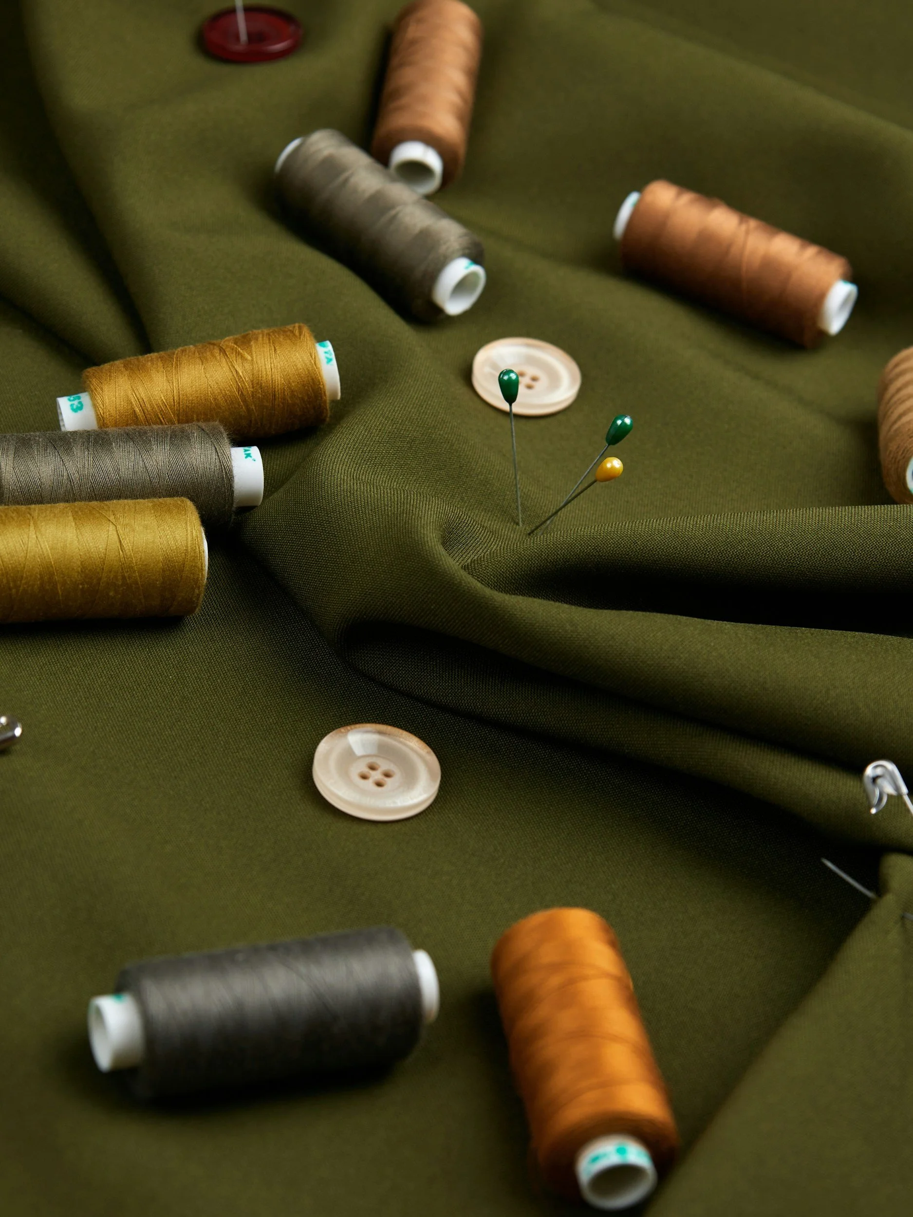 thread  buttons, ribbons, fabric
