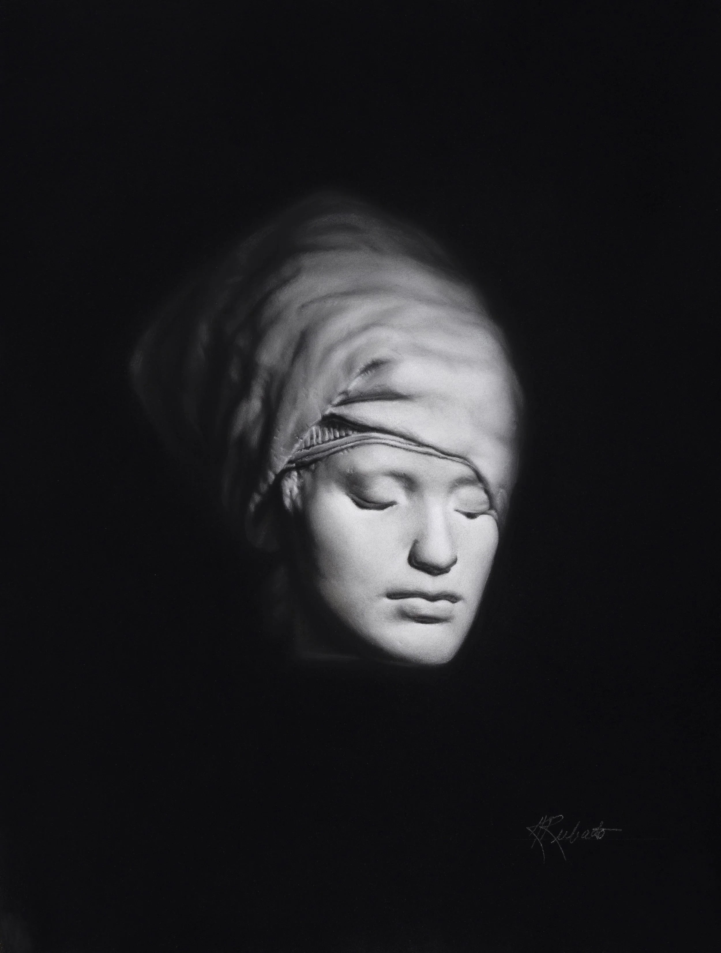 Black-and-white portrait of a smiling woman with eyes closed, partially covered by a dark scarf against a black background