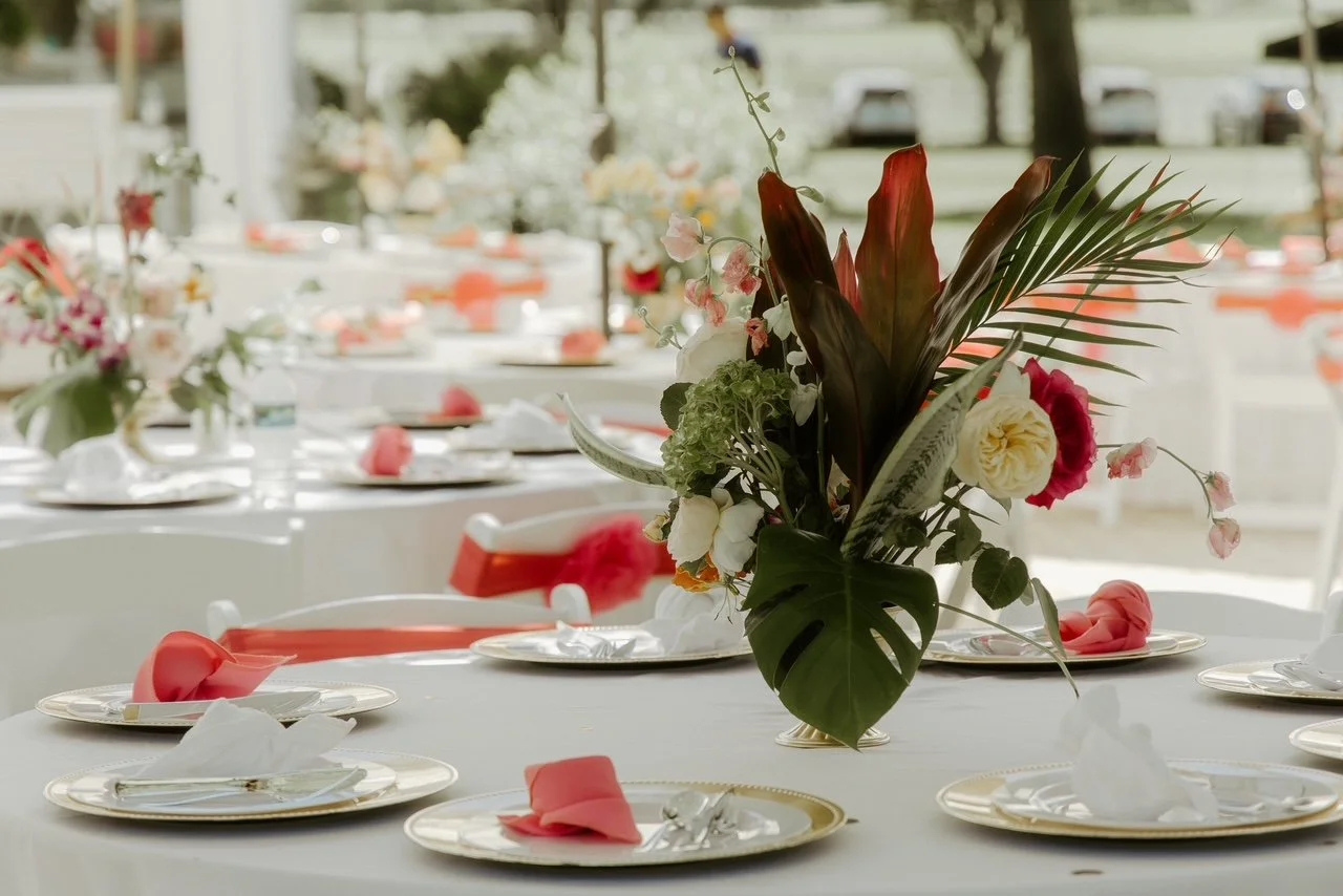 elegant reception table setting for a micro wedding at Five Oaks Farm event venue in Alachua, florida, with floral centerpiece and place settings