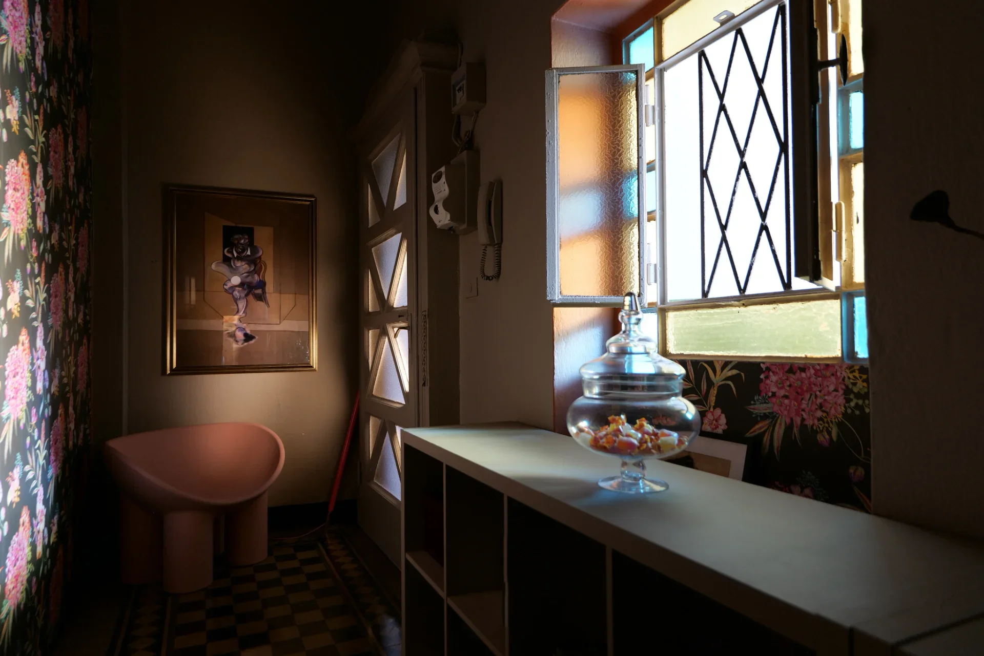 Roly-Poly chair beneath a Francis Bacon print, entrance — House of Frames, Milan