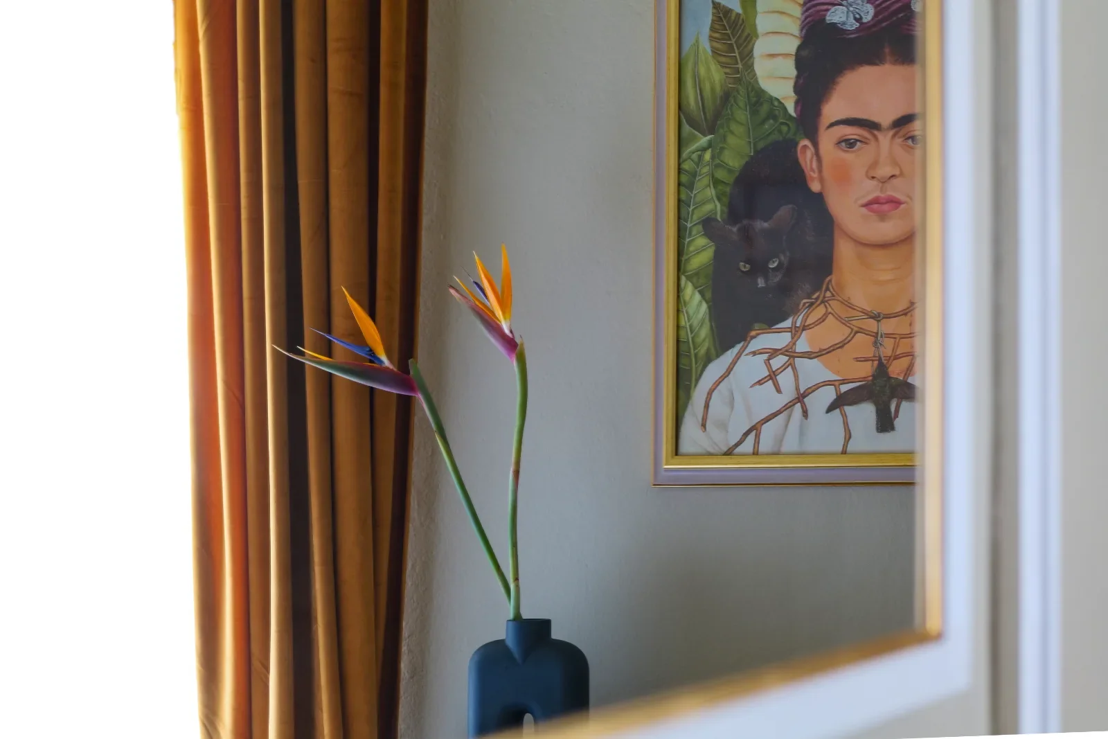 Frida Kahlo 'Self-Portrait with Thorn Necklace and Hummingbird' mirrored, Midsummer Night room — House of Frames, Milan