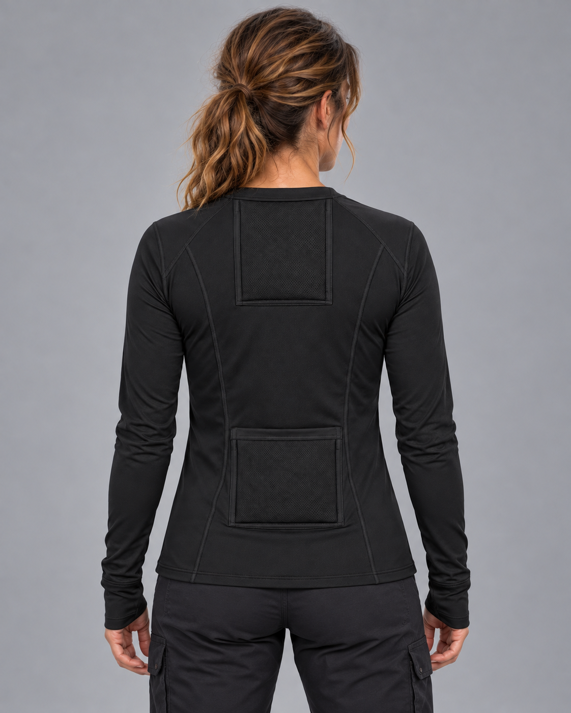 Black HEATJAC jacket back view in studio.png