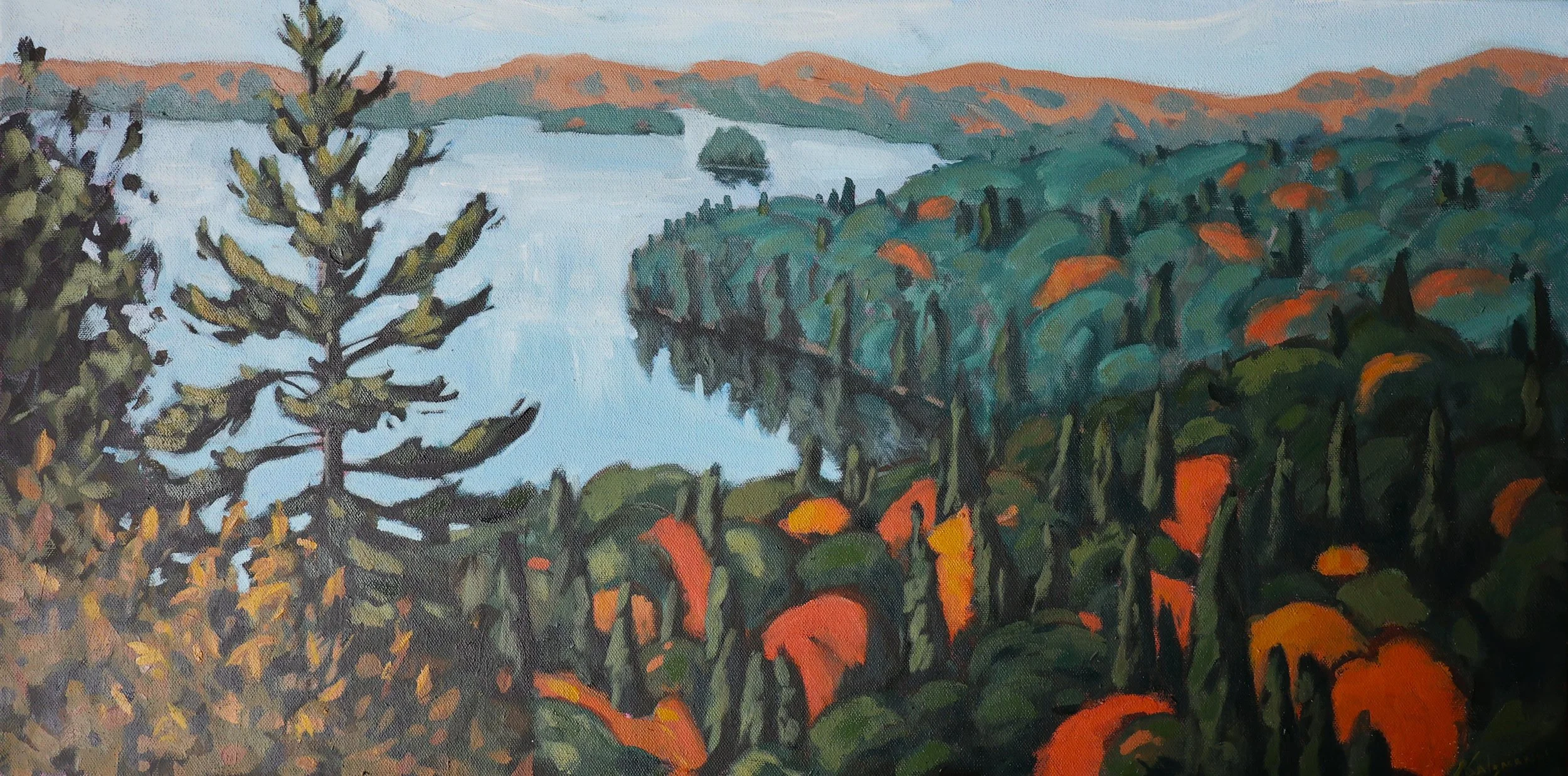 A painting of a lake in a valley in Algonquin Park with green, orange, and dark foliage on the banks. In the background, there are orange and green hills with a blue sky.
