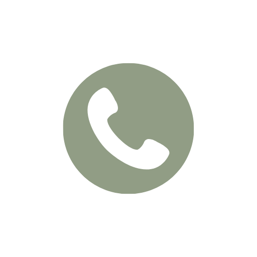 A cream-colored icon of a telephone receiver inside a sage green circle, representing contact information via phone.