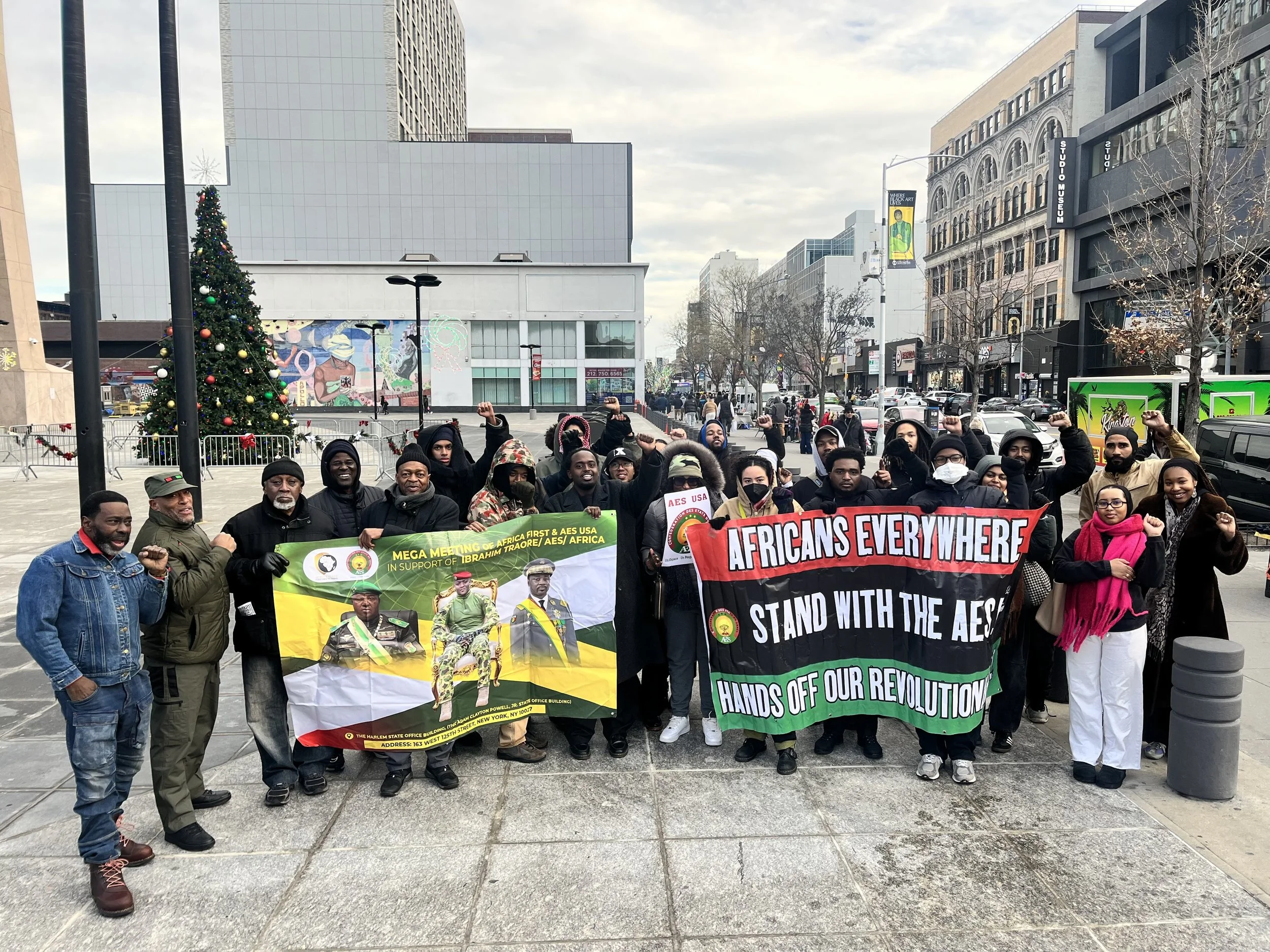 revolutionary comrades holding up revoolutionary banners