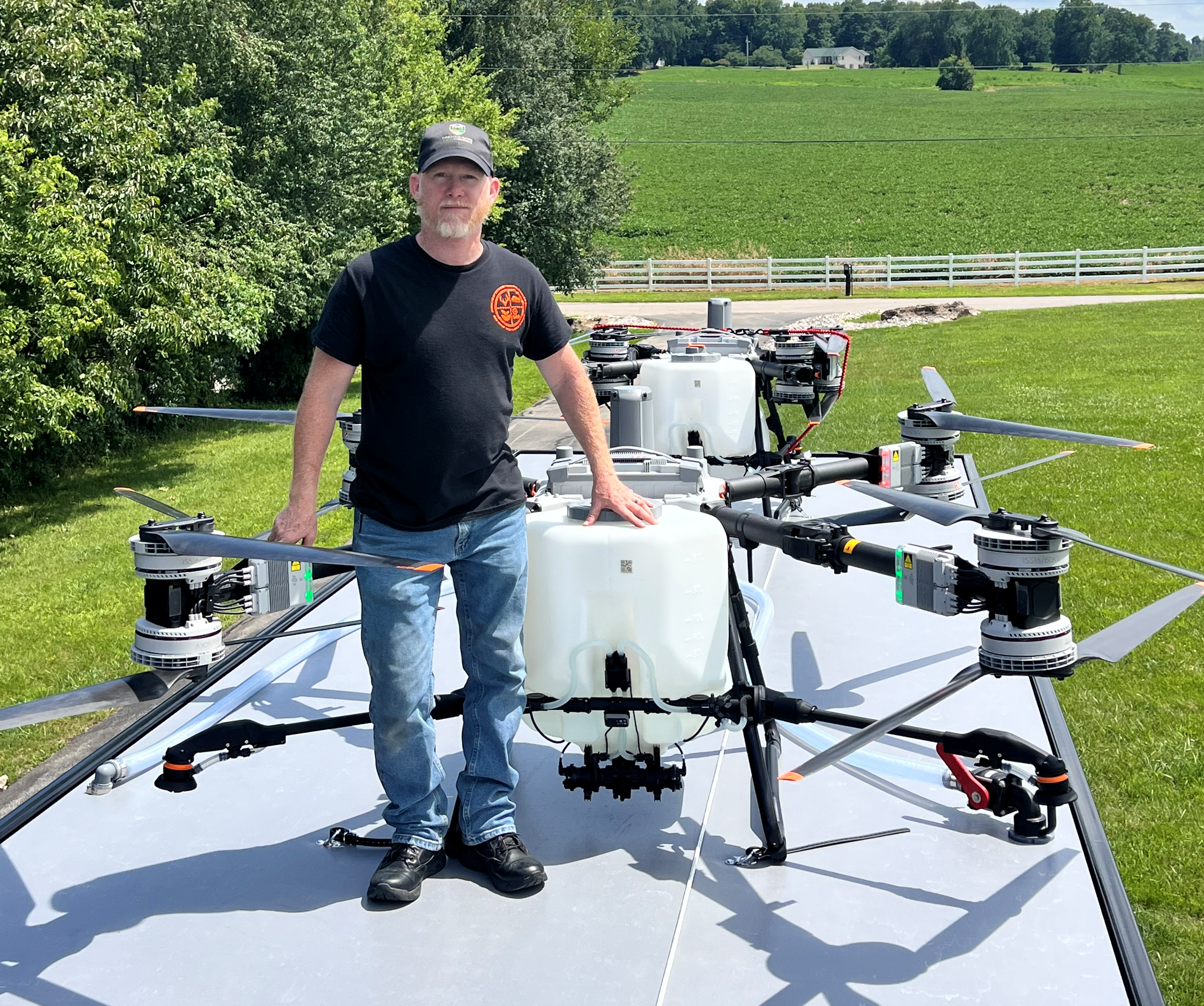 Owner of Nicholson AgriDrones, Joe Nicholson with his two DJI Agras T100 Agricultural Drones.