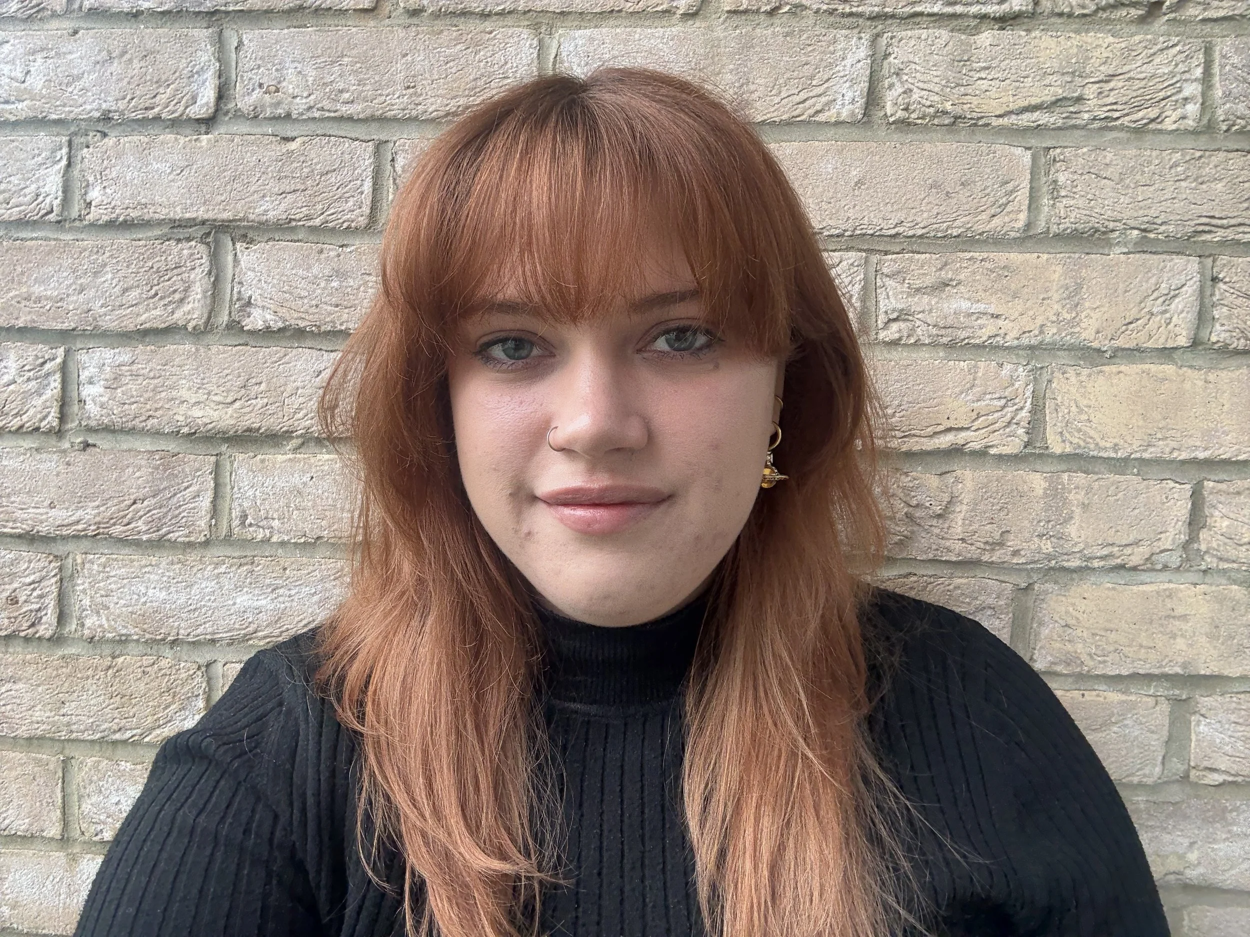 A headshot of Molly Wilson.