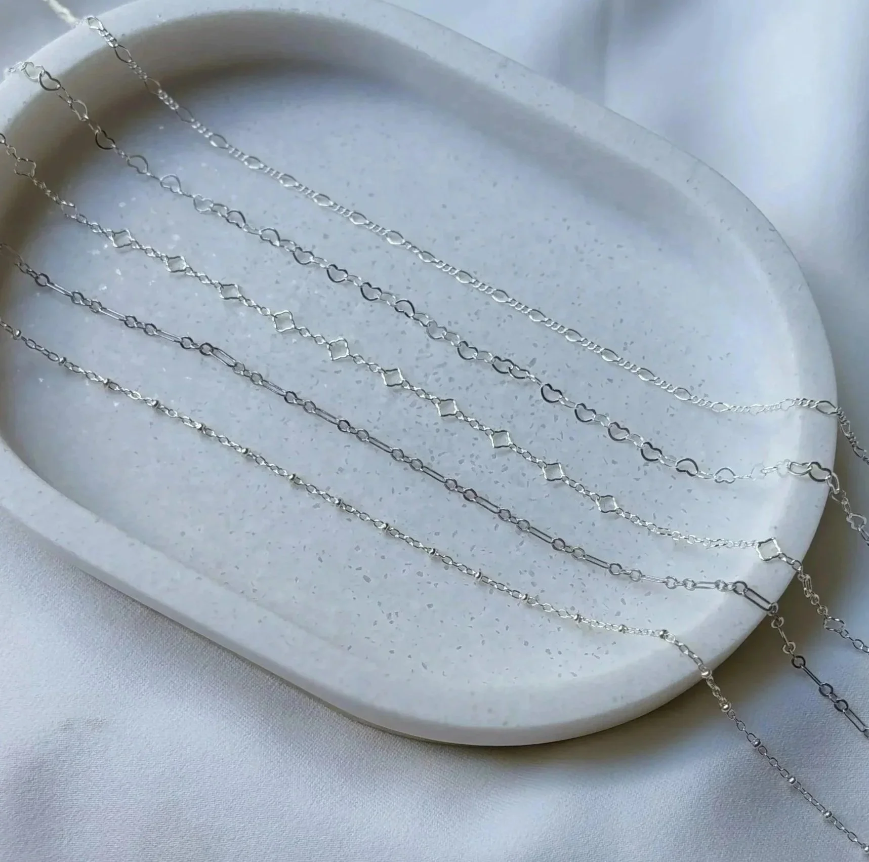 sterling silver chains in a variety of styles.  Dainty, delicate, bracelet, necklace and anklet chains.  Custom fit- chains