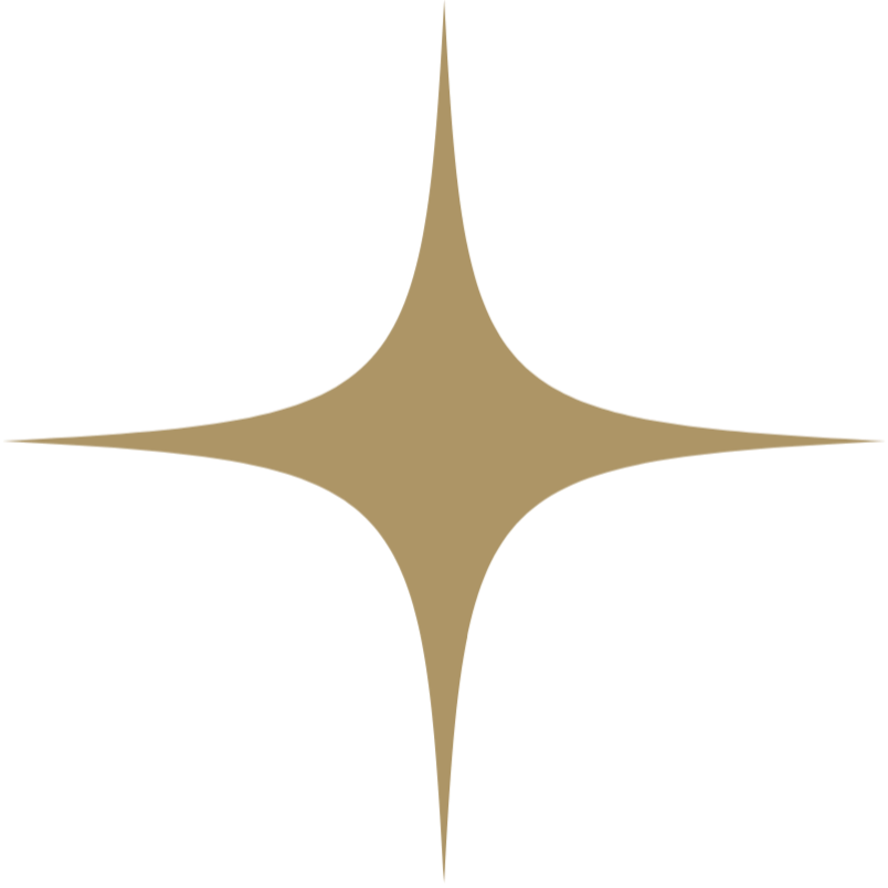 A golden star-shaped sparkle with four elongated points against a black background.