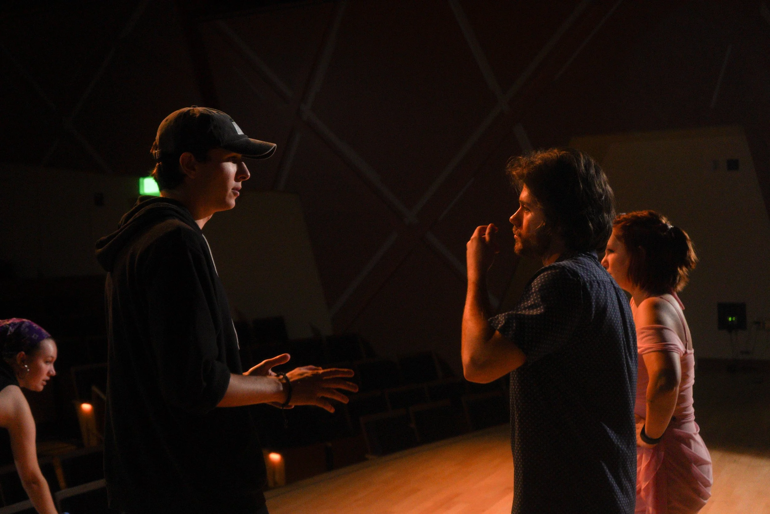 Aidan directs his actors on the set of Sonder.