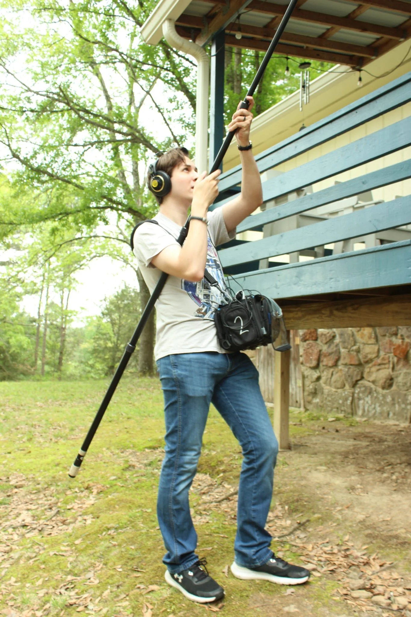 Aidan records sound on the set of Worthless Pit.