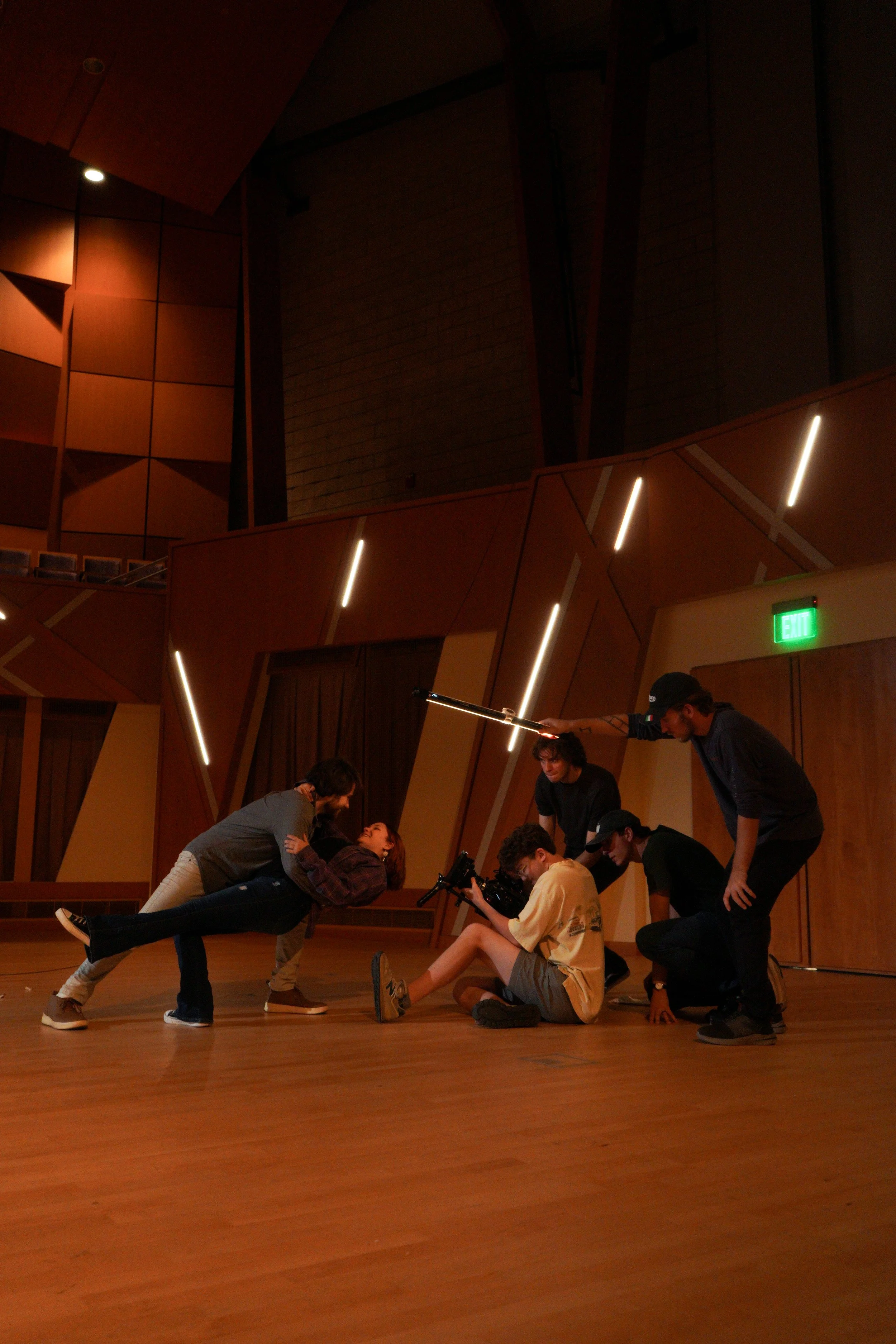 Director Aidan Kolokithas and choreographer Sophie Copelin rehearse a dance sequence with their actors (behind-the-scenes image from the movie "Sonder").