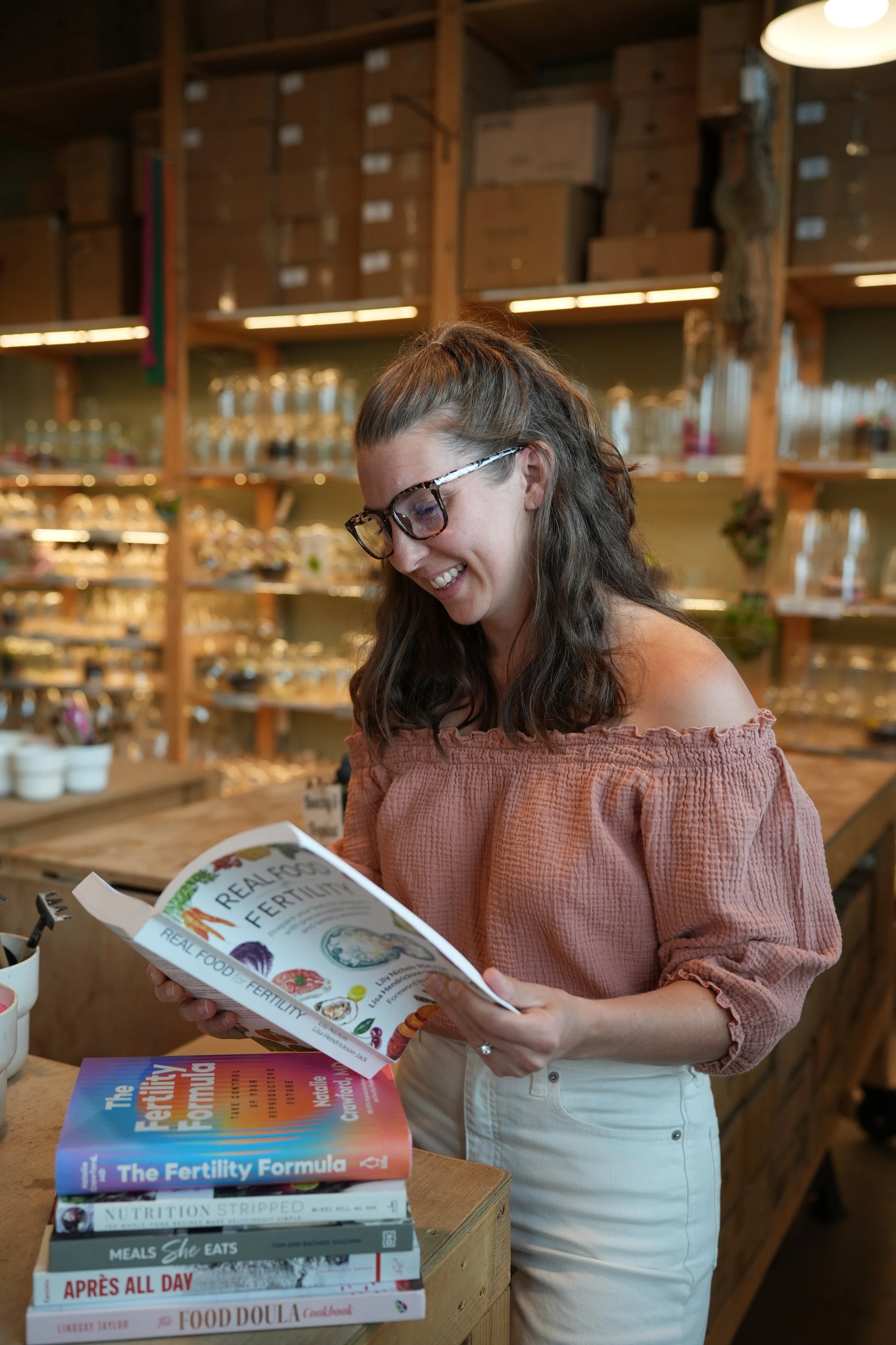 Fertility nutritionist reading 'The Fertility Formula' — evidence-based fertility nutrition