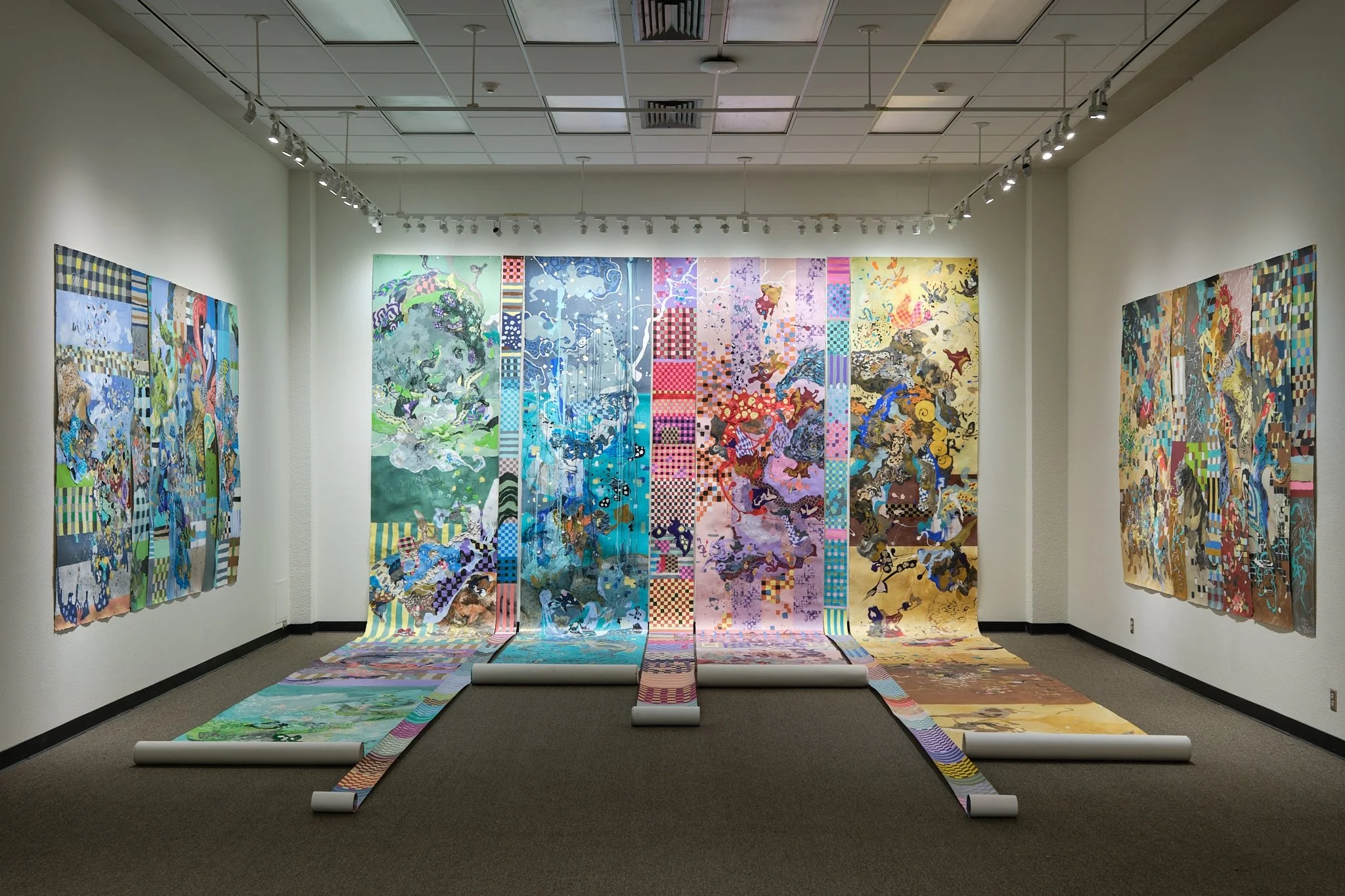 Number-37kmtgwjt (Center piece). 24x17.5’. Acrylic, gouache, ink,felt, oil pastel, yarn, mulberry paper, craft paper, sand, woven paper, Elmer's glue, tissue paper, cotton, paper pulp, mod podge, gold leaf, silver leaf, shimmer paper, canvas, linocut