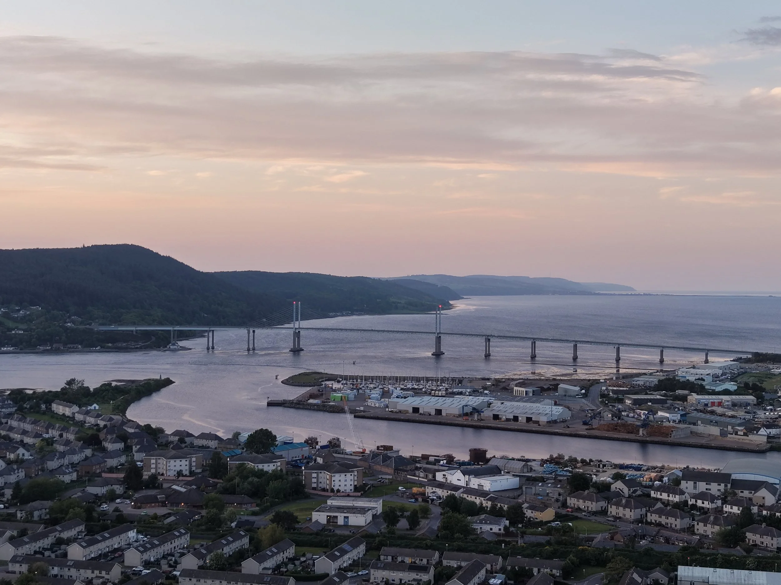 Breathtaking aerial view of the North Kessock bridge at dusk.