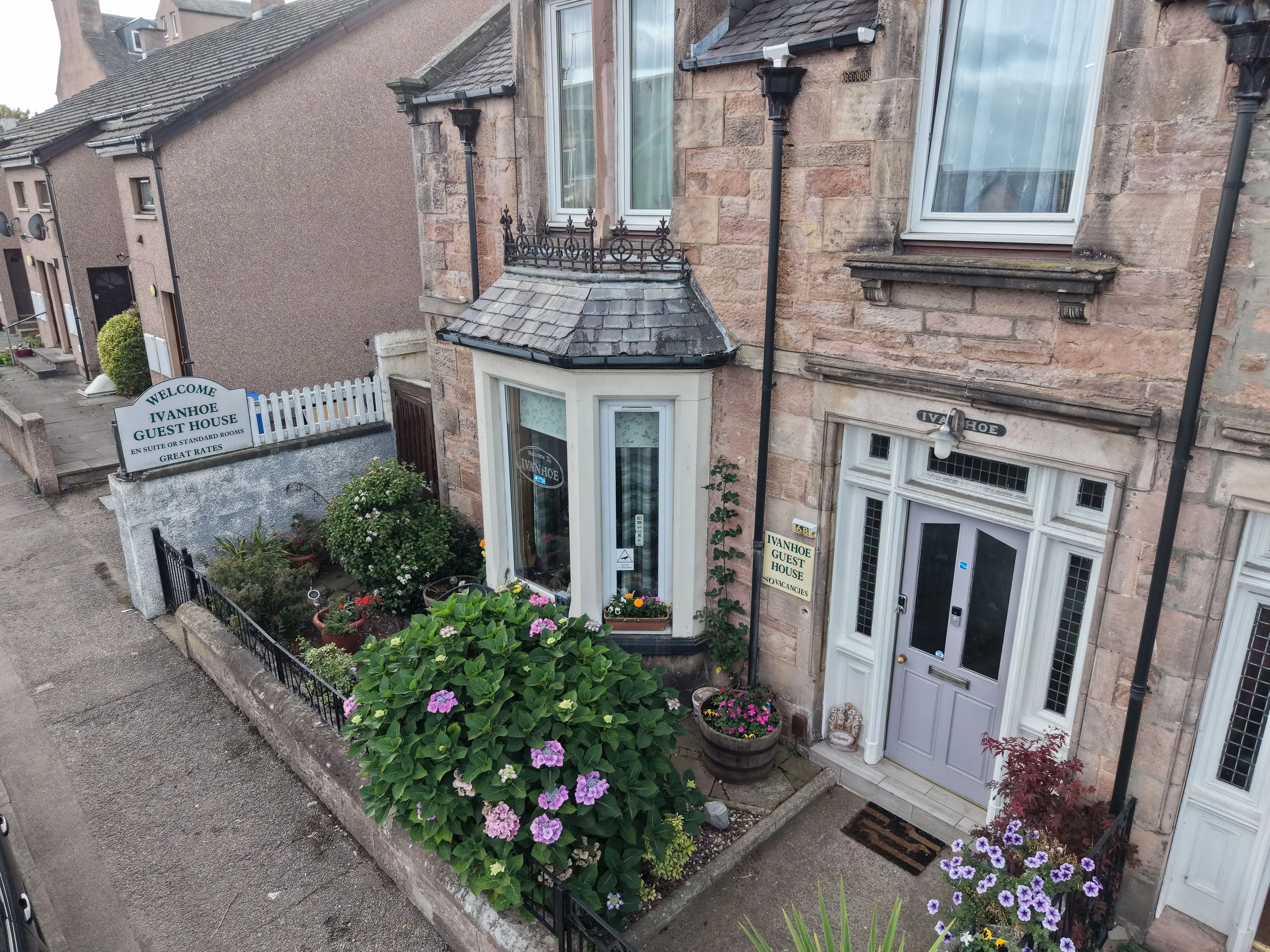 Featuring a classic and inviting street-front appearance, the front of the Ivanhoe Guest House blends seamlessly into the charming residential character of Lochalsh Road. Its well-maintained exterior and accessible roadside approach offer a warm, hos